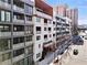 Modern building with street-level access and parking at 775 Juniper Ne St # 413, Atlanta, GA 30308