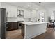 Modern kitchen with stainless steel appliances and an island at 775 Juniper Ne St # 413, Atlanta, GA 30308