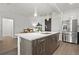 Modern kitchen with stainless steel appliances and an island at 775 Juniper Ne St # 413, Atlanta, GA 30308