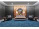 Elegant lobby with stylish seating and a wood wall at 775 Juniper Ne St # 413, Atlanta, GA 30308
