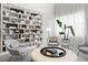 Relaxing lounge area with comfortable seating and a large bookcase at 775 Juniper Ne St # 413, Atlanta, GA 30308
