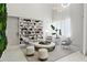 Relaxing lounge area with comfortable seating and a large bookcase at 775 Juniper Ne St # 413, Atlanta, GA 30308