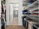 Large walk-in closet with ample shelving and hanging space at 775 Juniper Ne St # 413, Atlanta, GA 30308