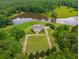 Aerial view showing home and surrounding landscape at 833 Hines Rd, Moreland, GA 30259