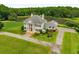 Luxury home on a large lot with a private pond at 833 Hines Rd, Moreland, GA 30259