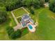 An aerial view of a home with a pool and large backyard at 833 Hines Rd, Moreland, GA 30259
