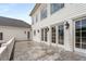 Large balcony with French doors and elegant railings at 833 Hines Rd, Moreland, GA 30259