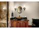 Elegant basement bathroom with dark wood vanity and a walk-in shower at 833 Hines Rd, Moreland, GA 30259