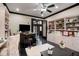 Craft room with built-in shelving, desk, and access to the backyard at 833 Hines Rd, Moreland, GA 30259