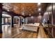 Finished basement with hardwood floors and a wet bar at 833 Hines Rd, Moreland, GA 30259