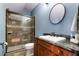 Modern bathroom with granite vanity and large walk-in shower at 833 Hines Rd, Moreland, GA 30259