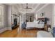 Spacious main bedroom with hardwood floors, fireplace, and large windows at 833 Hines Rd, Moreland, GA 30259