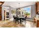 Charming breakfast room with a large window and seating for six at 833 Hines Rd, Moreland, GA 30259