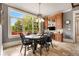 Eat-in kitchen area with built-in cabinetry and window seat at 833 Hines Rd, Moreland, GA 30259