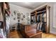 Spacious walk-in closet with island, custom shelving, and hanging space at 833 Hines Rd, Moreland, GA 30259