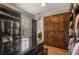 Generous walk-in closet with custom built-ins and natural light at 833 Hines Rd, Moreland, GA 30259