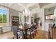 Formal dining room with hardwood floors, chandelier and large windows at 833 Hines Rd, Moreland, GA 30259