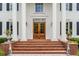 Grand entryway with double doors and brick steps at 833 Hines Rd, Moreland, GA 30259