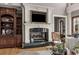 Elegant fireplace with a marble surround and built-in shelving at 833 Hines Rd, Moreland, GA 30259