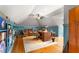 Home office with hardwood floors, built-in shelves and seating area at 833 Hines Rd, Moreland, GA 30259