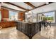 Large kitchen with island, breakfast nook, and lots of natural light at 833 Hines Rd, Moreland, GA 30259