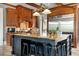 Gourmet kitchen with island, stainless steel appliances, and granite countertops at 833 Hines Rd, Moreland, GA 30259