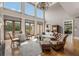 Open living area with hardwood floors, French doors, and high ceilings at 833 Hines Rd, Moreland, GA 30259