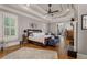 Spacious main bedroom with hardwood floors, fireplace, and coffered ceiling at 833 Hines Rd, Moreland, GA 30259