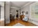 Bright home office with hardwood floors, built-in desk and window seat at 833 Hines Rd, Moreland, GA 30259
