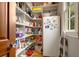 Large pantry with shelving, second refrigerator, and great storage at 833 Hines Rd, Moreland, GA 30259