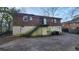 Rear view of house with stairs and a small patio at 1156 Sw Hubbard Sw St, Atlanta, GA 30310