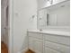 Bright bathroom with white cabinets, a large mirror, and modern fixtures at 1634 Ponce De Leon Ne Ave # 514, Atlanta, GA 30307