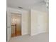 Spacious bedroom with neutral walls and carpet, and a view into the hallway at 1634 Ponce De Leon Ne Ave # 514, Atlanta, GA 30307