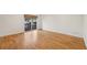 Bright bedroom with hardwood floors, large sliding glass doors, and a view of the outdoors at 1634 Ponce De Leon Ne Ave # 514, Atlanta, GA 30307