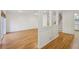 Open living room showcasing hardwood floors and built-in shelving at 1634 Ponce De Leon Ne Ave # 514, Atlanta, GA 30307