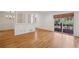 Bright living room featuring hardwood floors, large windows, and access to an adjacent dining room at 1634 Ponce De Leon Ne Ave # 514, Atlanta, GA 30307