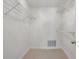 Walk-in closet featuring shelving and carpet at 1634 Ponce De Leon Ne Ave # 514, Atlanta, GA 30307
