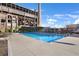 Community swimming pool with plenty of lounge chairs at 170 Boulevard Se # 114H, Atlanta, GA 30312