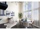 Bright dining area featuring a black table and modern chairs at 572 Edgewood Ne Ave # 301, Atlanta, GA 30312