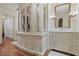 Elegant bathroom with marble vanity, custom cabinetry, and a large mirror at 106 Peachtree Battle Nw Ave, Atlanta, GA 30305