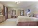 Large bedroom with hanging chair and hardwood floors at 106 Peachtree Battle Nw Ave, Atlanta, GA 30305