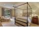 Spacious bedroom with a four-poster bed and access to a private patio at 106 Peachtree Battle Nw Ave, Atlanta, GA 30305