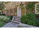 Brick front entrance with stone steps and landscaping at 106 Peachtree Battle Nw Ave, Atlanta, GA 30305