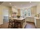 Updated kitchen with marble countertops and stainless steel appliances at 106 Peachtree Battle Nw Ave, Atlanta, GA 30305