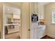 Well-equipped kitchen with coffee bar and ample cabinetry at 106 Peachtree Battle Nw Ave, Atlanta, GA 30305