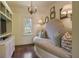 Cozy reading nook with built-in shelving and comfortable window seat at 106 Peachtree Battle Nw Ave, Atlanta, GA 30305