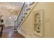 Grand staircase with wrought iron railing and a unique niche at 106 Peachtree Battle Nw Ave, Atlanta, GA 30305