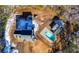 Bird's-eye view of house, pool, and surrounding woods at 3246 E 5 E Hwy, Carrollton, GA 30116