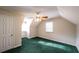 Charming bedroom with green carpet, ceiling fan and window at 3246 E 5 E Hwy, Carrollton, GA 30116