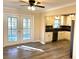 Dining area with hardwood floors and access to deck at 3464 Creatwood Se Trl, Smyrna, GA 30080